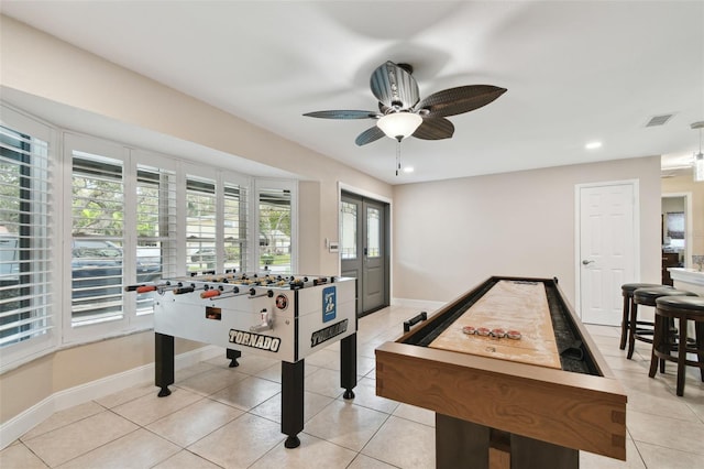 game room featuring light tile patterned floors and ceiling fan