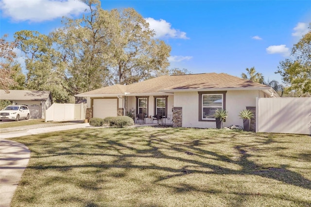 ranch-style home with a garage, a porch, and a front lawn