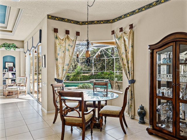 dining room featuring arched walkways, a textured ceiling, and light tile patterned floors