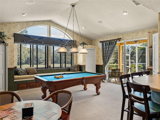 playroom featuring wallpapered walls, visible vents, wainscoting, vaulted ceiling, and carpet floors