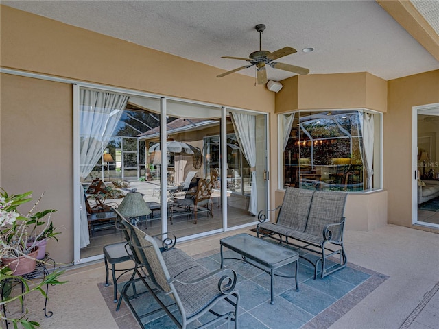 view of patio / terrace featuring ceiling fan