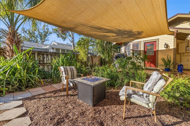 view of patio / terrace with a fire pit