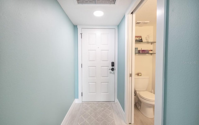 doorway with light hardwood / wood-style flooring