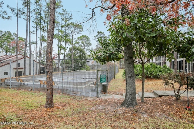 view of yard featuring tennis court