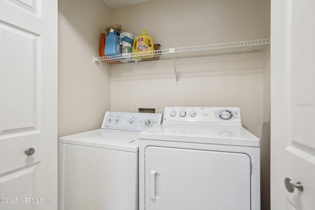 washroom featuring separate washer and dryer