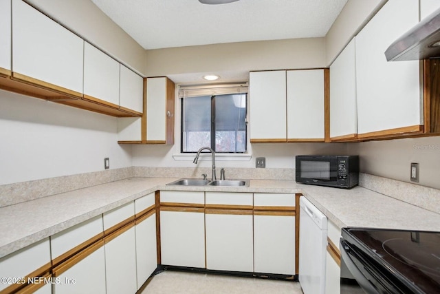 kitchen featuring white cabinetry, white dishwasher, extractor fan, and sink