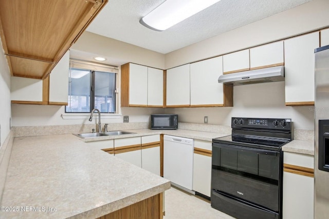 kitchen with sink, a textured ceiling, black appliances, and white cabinets