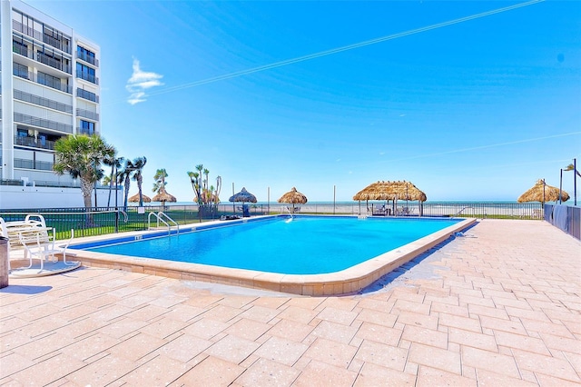 view of swimming pool with a patio area