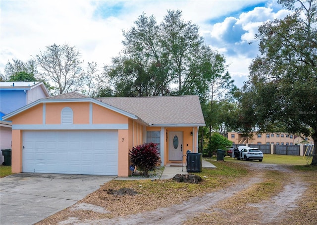 view of front of property with a garage