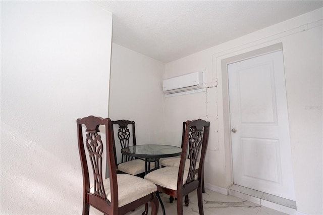 dining room featuring an AC wall unit