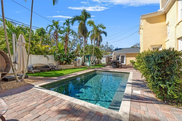 view of swimming pool featuring a patio