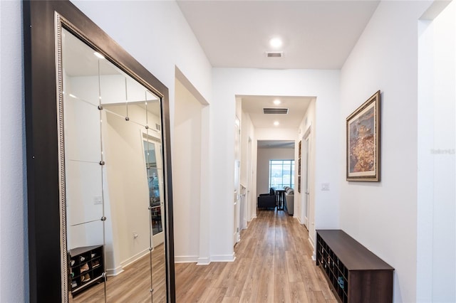 hall featuring light hardwood / wood-style flooring