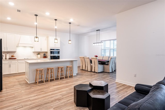 living room featuring light hardwood / wood-style floors