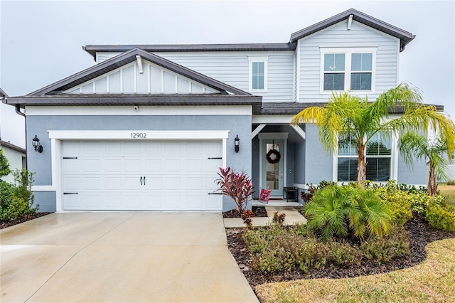 view of front of property featuring a garage