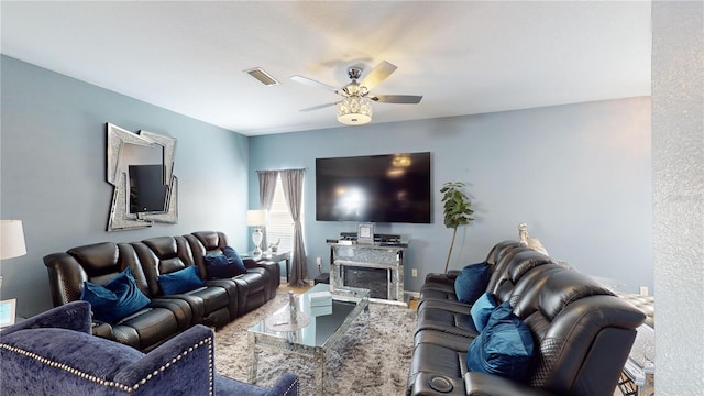 living room featuring ceiling fan