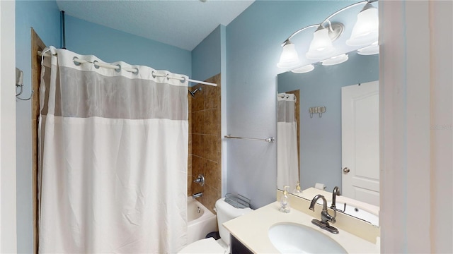 full bathroom featuring shower / bath combination with curtain, vanity, toilet, and a textured ceiling