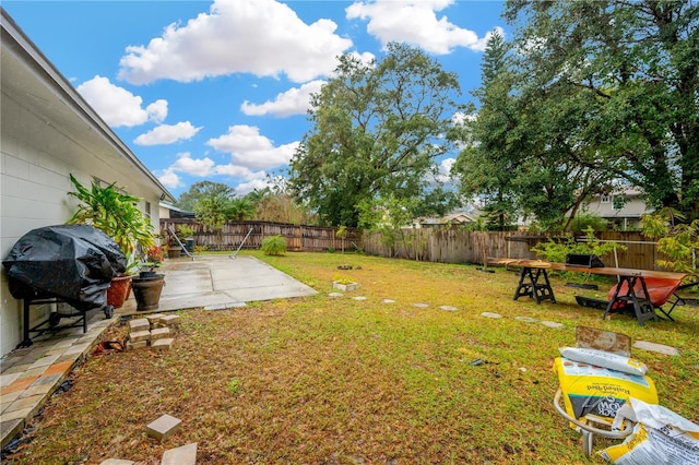 view of yard with a patio area