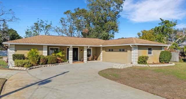 single story home featuring a garage