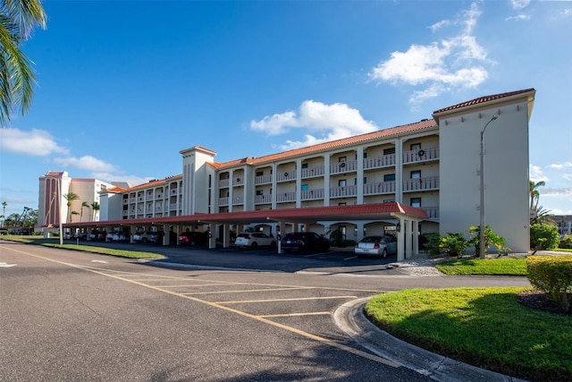 view of property with covered parking