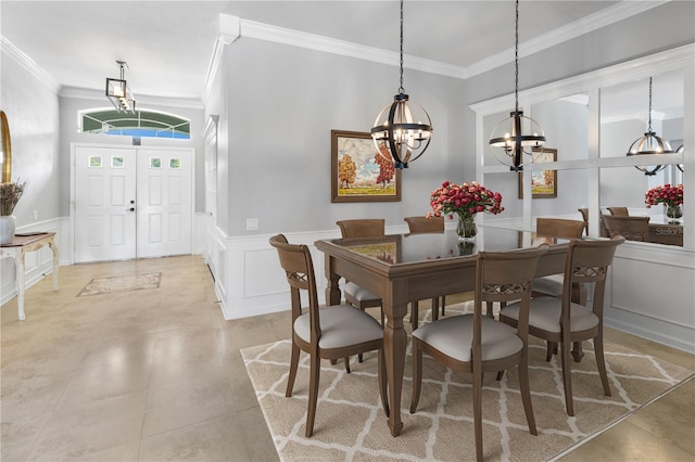 dining room featuring crown molding