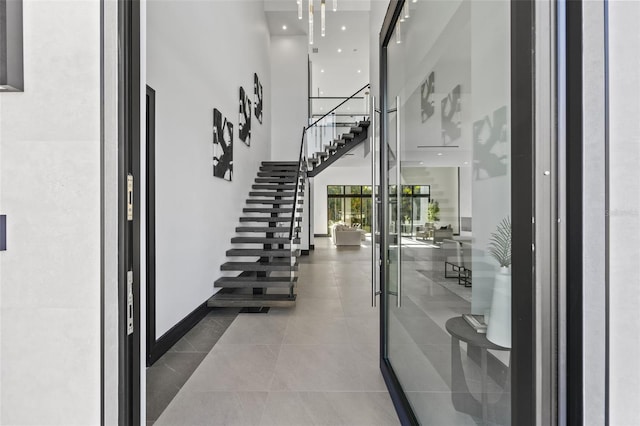 foyer featuring a high ceiling