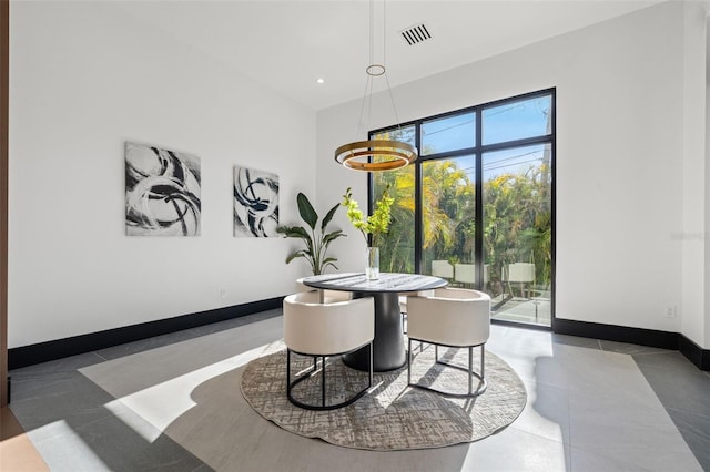 dining room with tile patterned floors