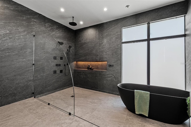 bathroom with a tile shower