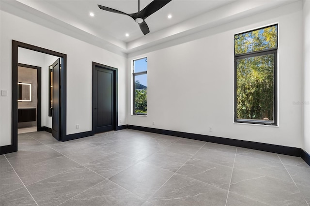 interior space featuring ceiling fan