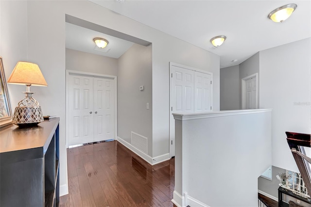 entrance foyer with dark hardwood / wood-style flooring