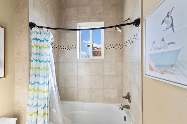 bathroom with shower / bathtub combination with curtain