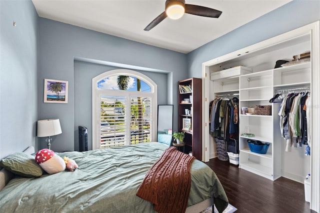 bedroom featuring dark wood-type flooring and ceiling fan