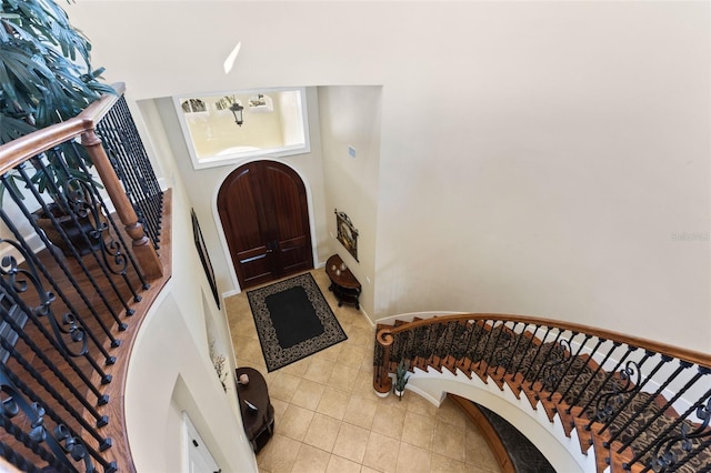 foyer featuring light tile patterned floors