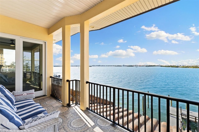 balcony featuring a water view