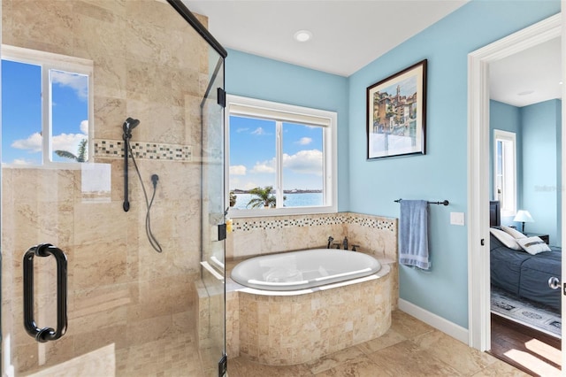 bathroom featuring separate shower and tub and tile patterned flooring