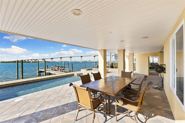 view of patio / terrace with a water view