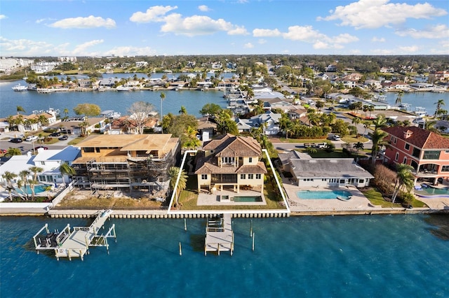 bird's eye view with a water view