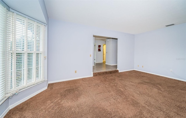 view of carpeted spare room