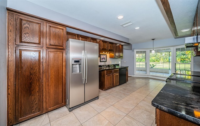 kitchen featuring sink, hanging light fixtures, light tile patterned floors, stainless steel fridge, and dishwasher