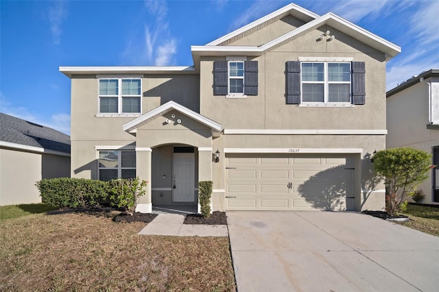 front of property with a garage