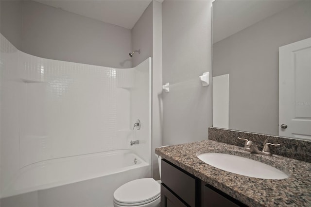 full bathroom featuring shower / tub combination, vanity, and toilet