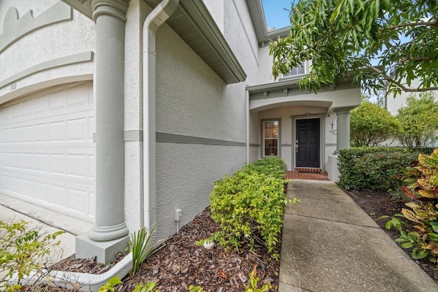 entrance to property with a garage