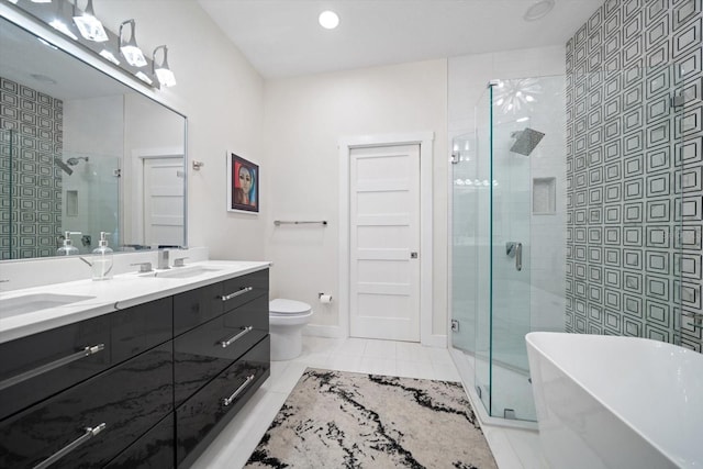 full bathroom featuring vanity, toilet, separate shower and tub, and tile patterned flooring