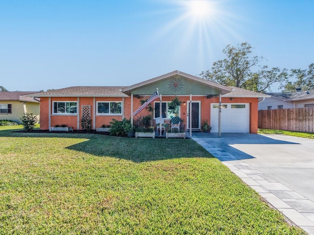 ranch-style house with a garage and a front yard