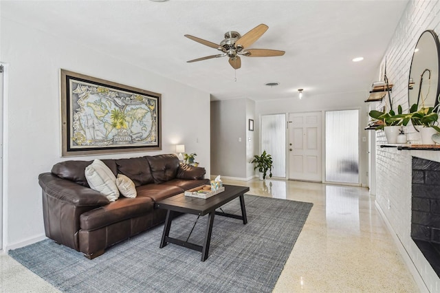 living room featuring ceiling fan