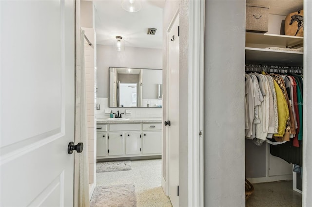 bathroom featuring vanity