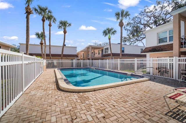 view of pool featuring a patio