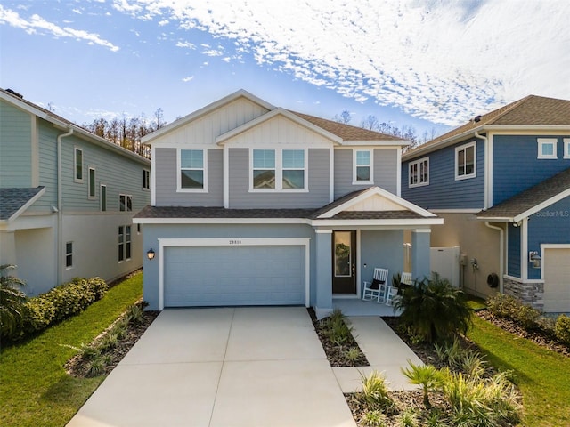 view of front of home featuring a garage and a porch