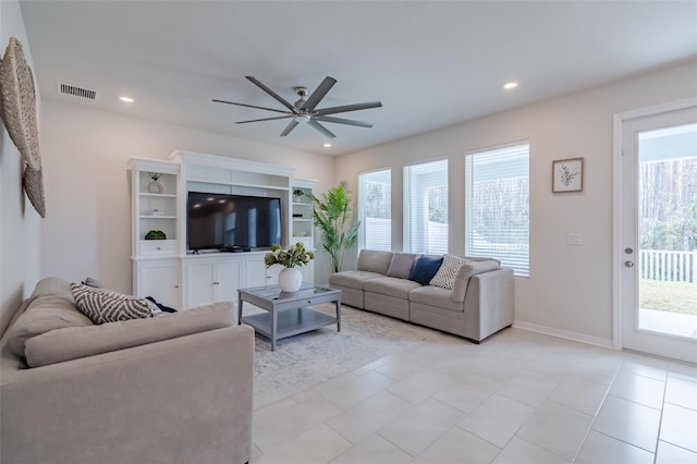 living room featuring ceiling fan