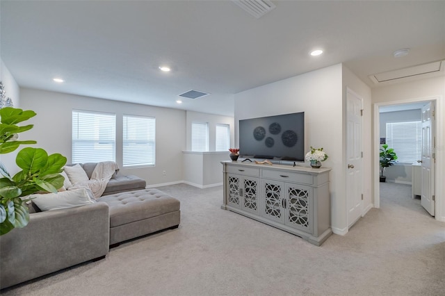 living room featuring light carpet