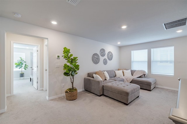 living room with light carpet